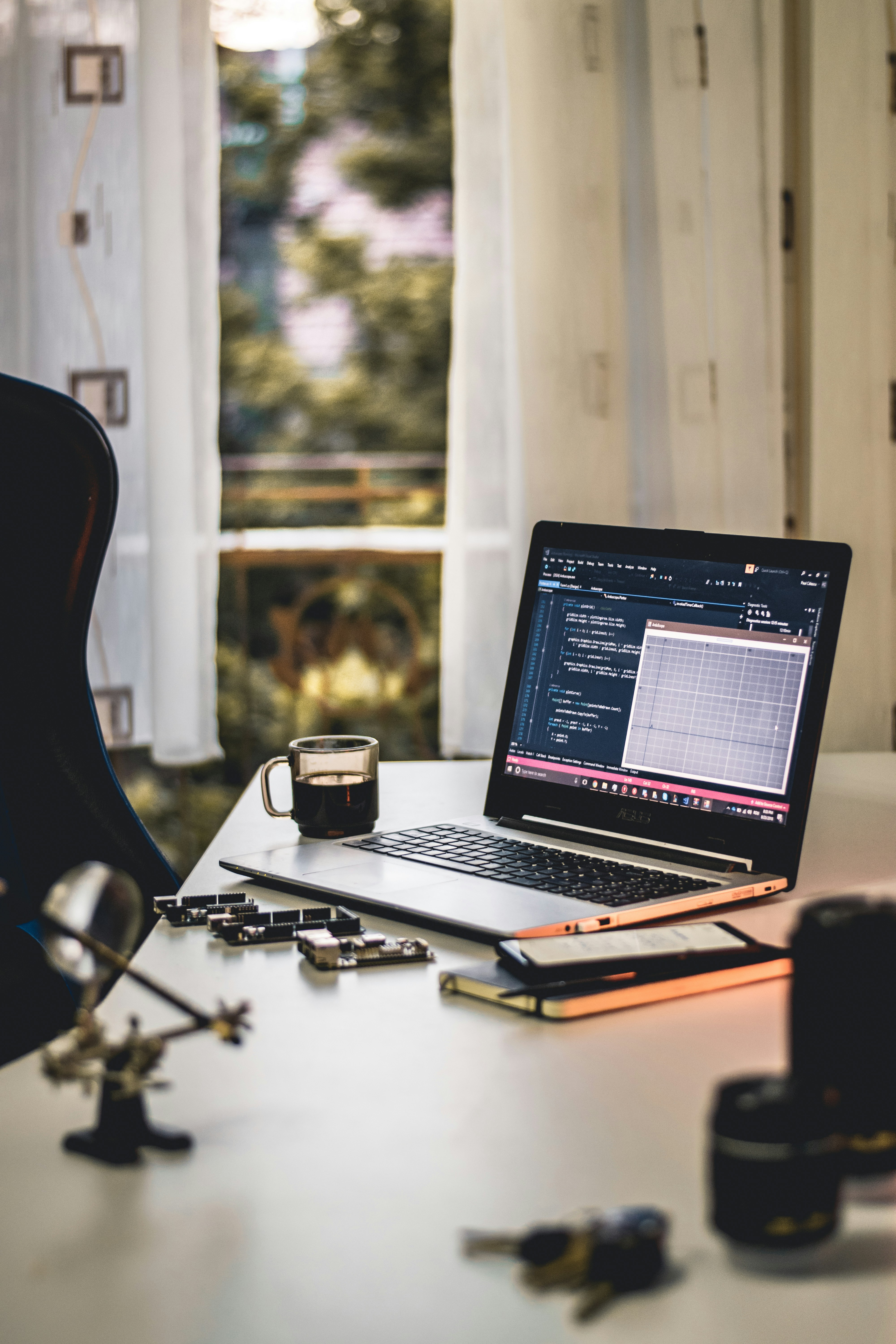 laptop and morning coffe on a desk